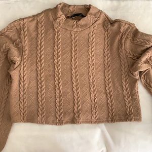 Teddy material crop sweater.